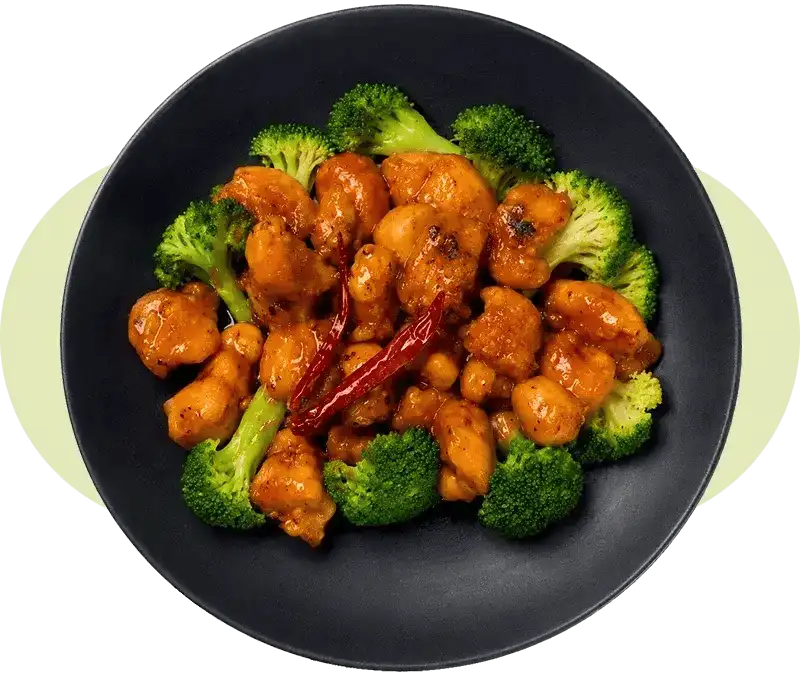 Hot and spicy orange chicken made with halal chicken and sweet tangy Chinese sauce